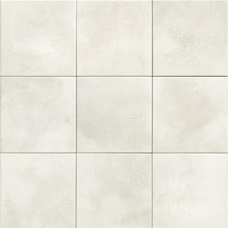 Neuf carreaux Tikida Blanco 20 × 20 cm de Mainzu, vus de face, aux nuances blanc cassé.